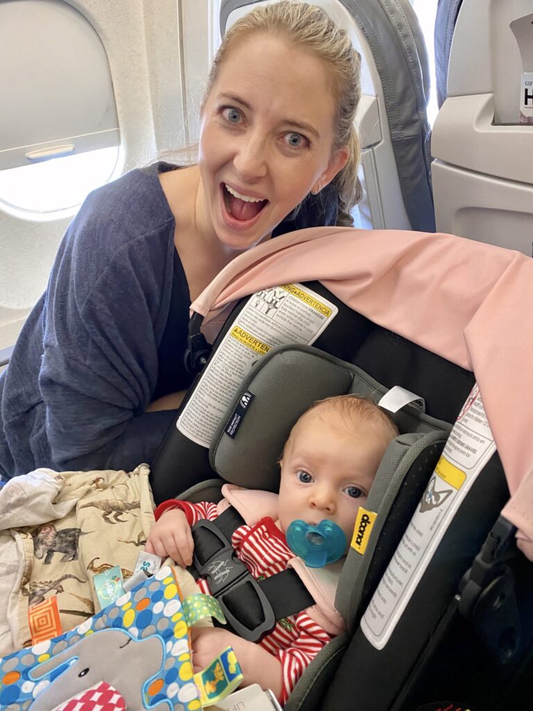 Jen and baby on airplane.